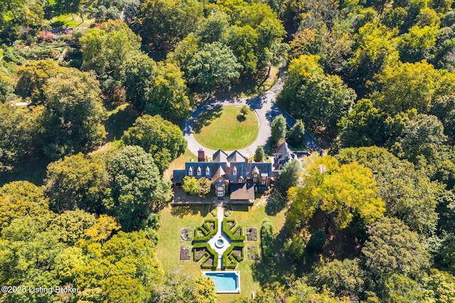 bird's eye view with a view of trees