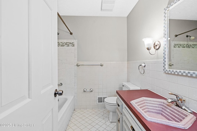 4904 Ruby Way, Shepherdsville, KY 40165 - bathroom with tile walls, toilet, tile patterned floors,  shower combination, and vanity
