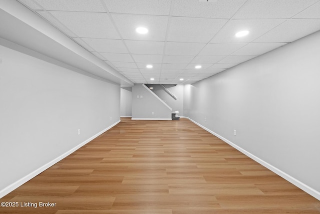 4904 Ruby Way, Shepherdsville, KY 40165 - finished below grade area featuring recessed lighting, baseboards, light wood-style flooring, and a drop ceiling