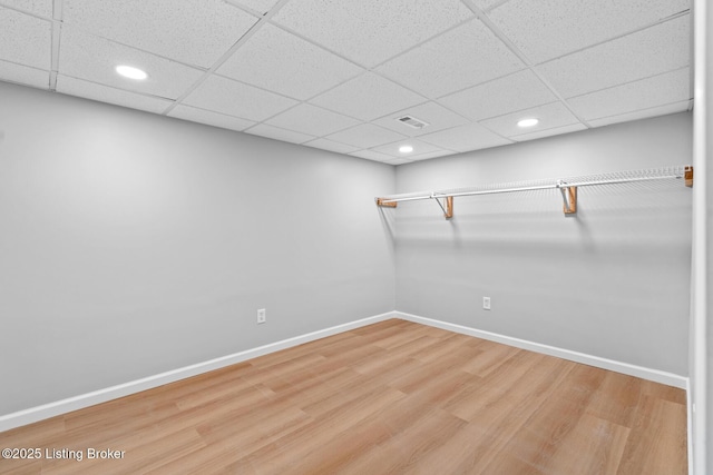 4904 Ruby Way, Shepherdsville, KY 40165 - empty room featuring wood finished floors, baseboards, recessed lighting, and a drop ceiling