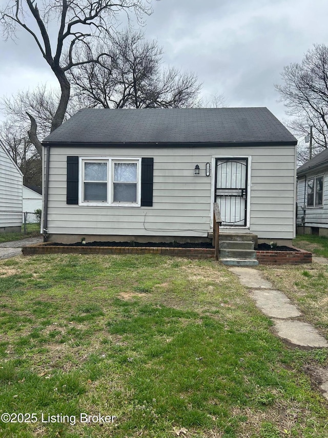 1153 Lincoln Ave, Louisville, KY 40208 - view of front of home with a front yard