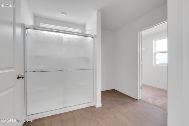 3013 Cherry Glen Dr, La Grange, KY 40031 - bathroom featuring a stall shower, baseboards, and wood finished floors
