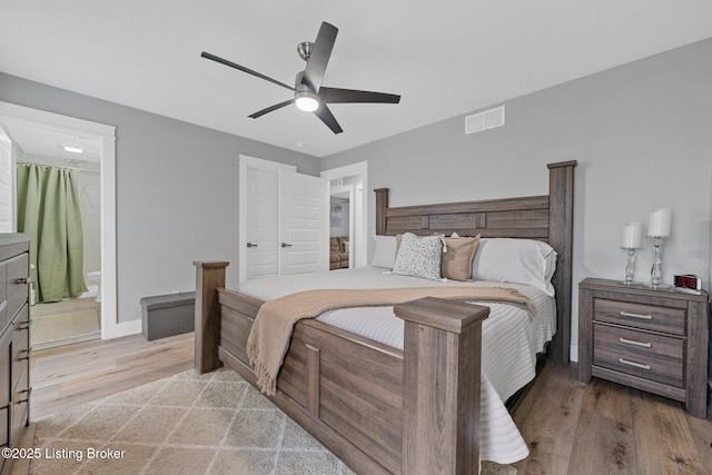 3965 Broadford Rd, Clarkson, KY 42726 - bedroom featuring baseboards, visible vents, wood finished floors, and a ceiling fan