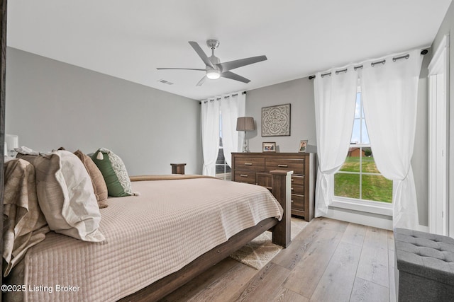 3965 Broadford Rd, Clarkson, KY 42726 - bedroom featuring visible vents, light wood-style floors, and a ceiling fan