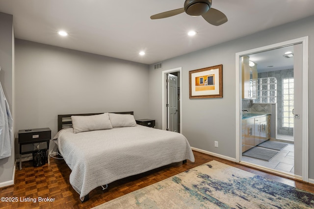 bedroom featuring baseboards, recessed lighting, ensuite bath, a ceiling fan, and visible vents