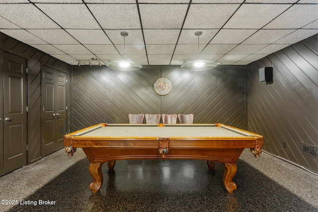 game room with a paneled ceiling, carpet flooring, and pool table