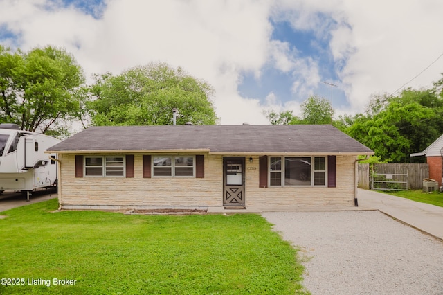 230 S Skyline Dr, Louisville, KY 40229 - view of front of home featuring stone siding and a shingled roof