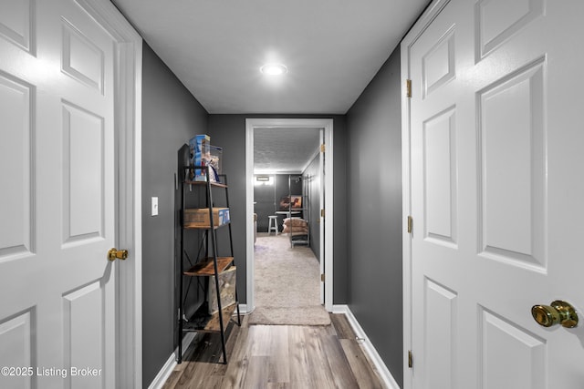 2410 Mammoth Way, Louisville, KY 40299 - hallway with baseboards and wood finished floors