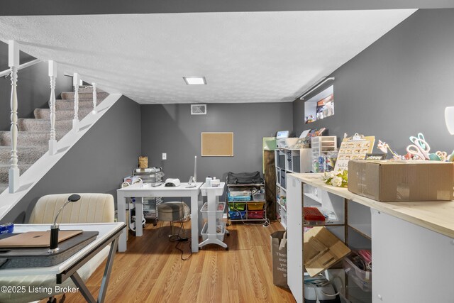 2410 Mammoth Way, Louisville, KY 40299 - office area featuring wood finished floors and a textured ceiling