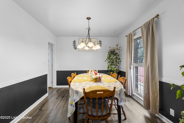2410 Mammoth Way, Louisville, KY 40299 - dining space featuring baseboards, a chandelier, and wood finished floors