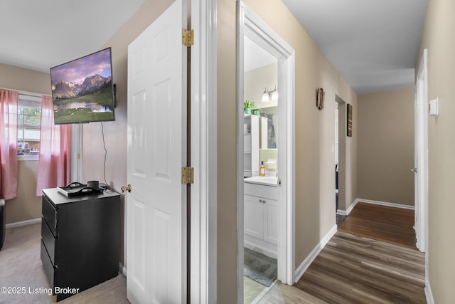 2410 Mammoth Way, Louisville, KY 40299 - hall with baseboards and wood finished floors