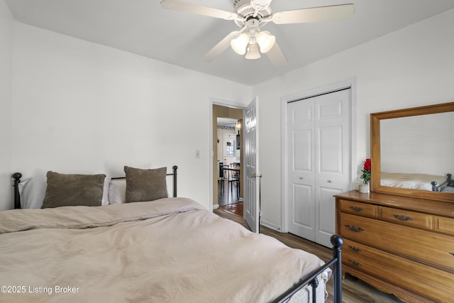 2410 Mammoth Way, Louisville, KY 40299 - bedroom featuring a closet, a ceiling fan, and wood finished floors