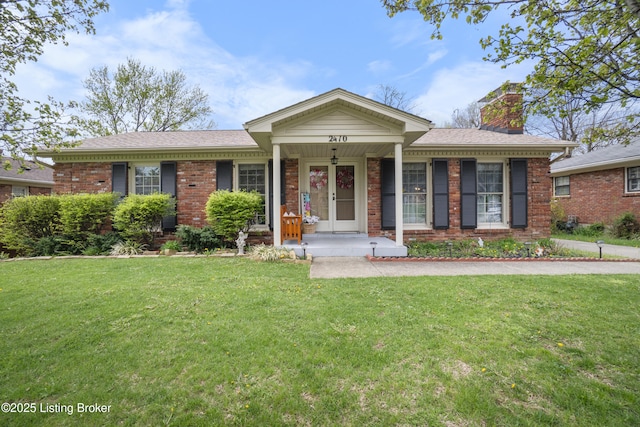 2410 Mammoth Way, Louisville, KY 40299 - single story home with a front yard, a shingled roof, covered porch, a chimney, and brick siding