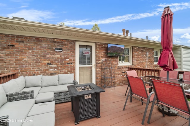 2410 Mammoth Way, Louisville, KY 40299 - wooden terrace featuring an outdoor living space with a fire pit and outdoor dining area