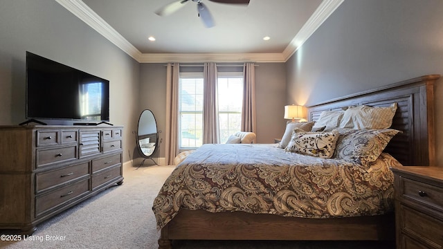 bedroom featuring light carpet, ornamental molding, and a ceiling fan