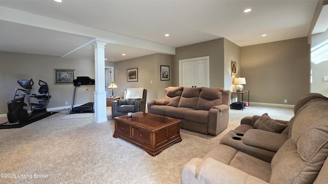 living room featuring ornate columns, baseboards, light carpet, and recessed lighting