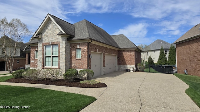 view of side of home featuring concrete driveway, a shingled roof, stone siding, and an attached garage