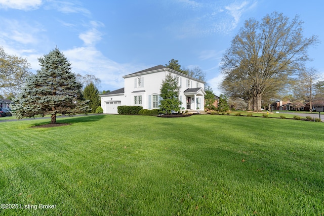 view of yard featuring an attached garage