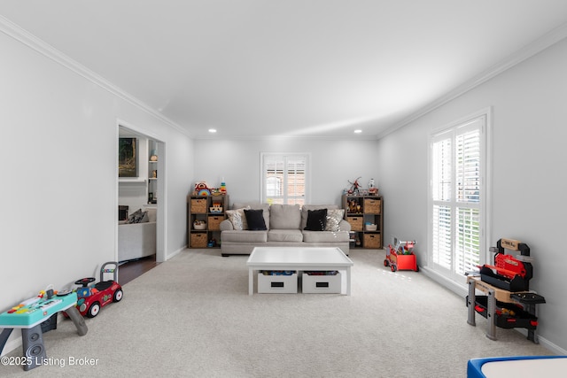 carpeted living room with recessed lighting, baseboards, crown molding, and a healthy amount of sunlight
