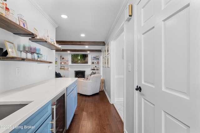 interior space featuring crown molding, dark wood-type flooring, recessed lighting, beverage cooler, and baseboards