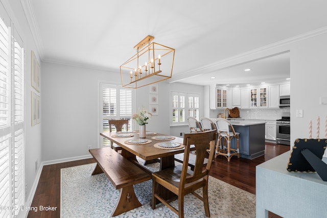 dining space with crown molding, baseboards, recessed lighting, and dark wood finished floors