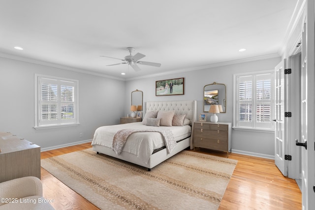 bedroom featuring light wood-style flooring, baseboards, and ornamental molding