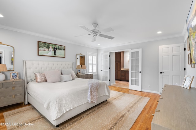 bedroom featuring ornamental molding, french doors, light wood-type flooring, and recessed lighting