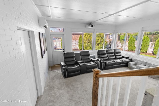 carpeted living room featuring an AC wall unit