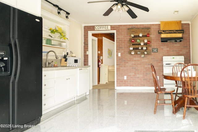 138 E Main St, Glendale, KY 42740 - kitchen with white appliances, brick wall, ornamental molding, a sink, and a ceiling fan