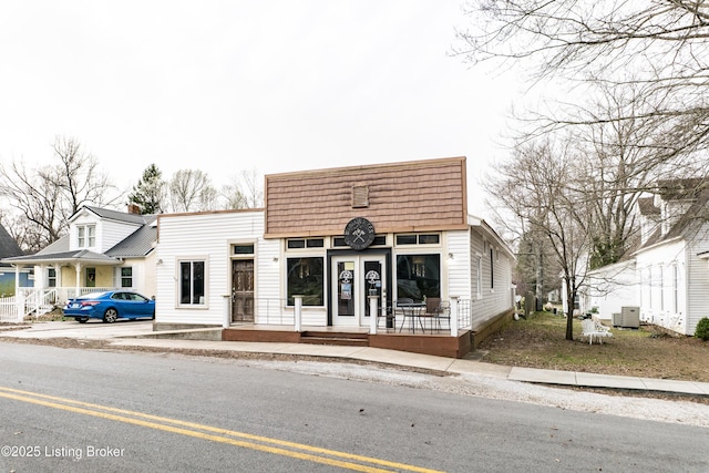138 E Main St, Glendale, KY 42740 - view of front of house with cooling unit and a porch