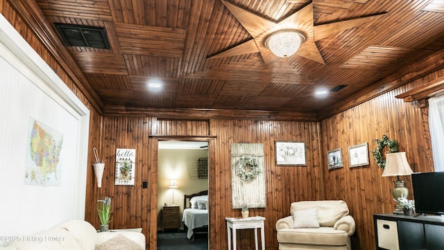 138 E Main St, Glendale, KY 42740 - interior space with wooden walls, visible vents, carpet, and wood ceiling