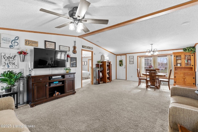 living room featuring crown molding, ceiling fan with notable chandelier, lofted ceiling, and a textured ceiling