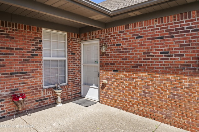 591 Arrowhead Ln, Shepherdsville, KY 40165 - doorway to property with brick siding and roof with shingles
