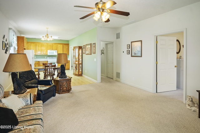 591 Arrowhead Ln, Shepherdsville, KY 40165 - living room with light colored carpet, baseboards, a ceiling fan, and visible vents