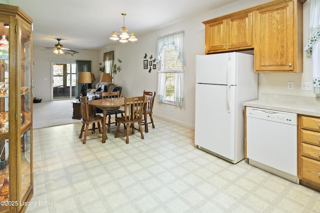 591 Arrowhead Ln, Shepherdsville, KY 40165 - kitchen featuring white appliances, open floor plan, light countertops, light floors, and ceiling fan with notable chandelier