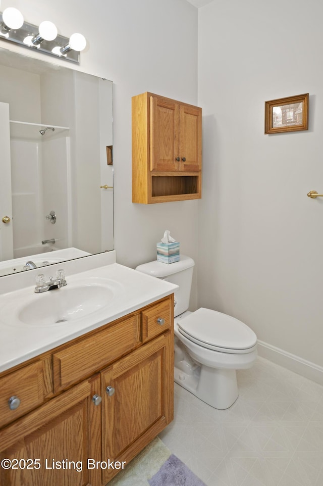 591 Arrowhead Ln, Shepherdsville, KY 40165 - bathroom featuring toilet, vanity, shower / washtub combination, and baseboards