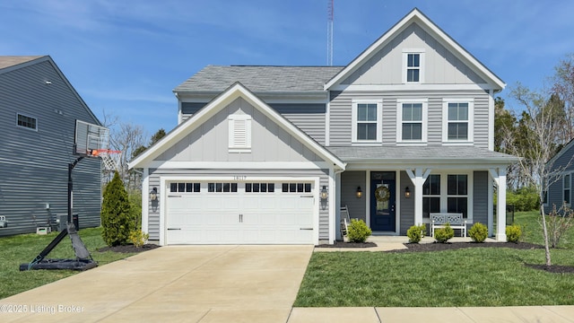 traditional home with concrete driveway, a front lawn, board and batten siding, and covered porch