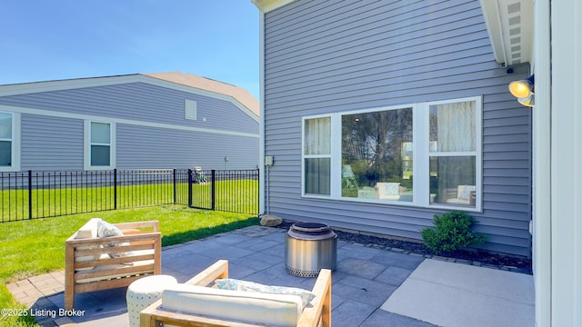 view of patio featuring fence