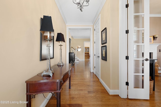 9502 Gerardia Ln, Prospect, KY 40059 - hallway featuring wood finished floors, crown molding, and baseboards