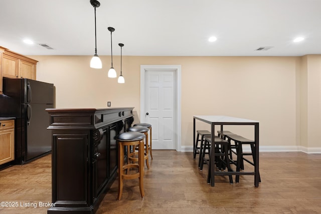 9502 Gerardia Ln, Prospect, KY 40059 - kitchen featuring freestanding refrigerator, recessed lighting, wood finished floors, and baseboards