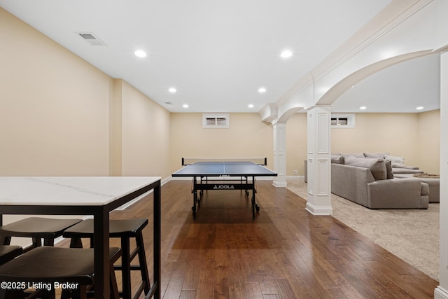 9502 Gerardia Ln, Prospect, KY 40059 - game room with ornate columns, arched walkways, hardwood / wood-style floors, recessed lighting, and baseboards