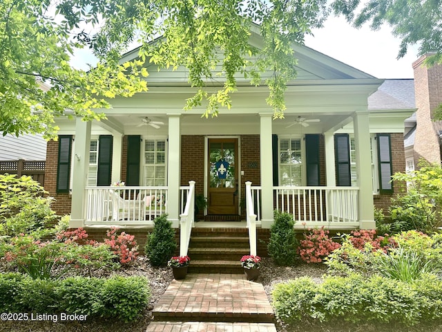 9502 Gerardia Ln, Prospect, KY 40059 - property entrance with covered porch, a ceiling fan, and brick siding