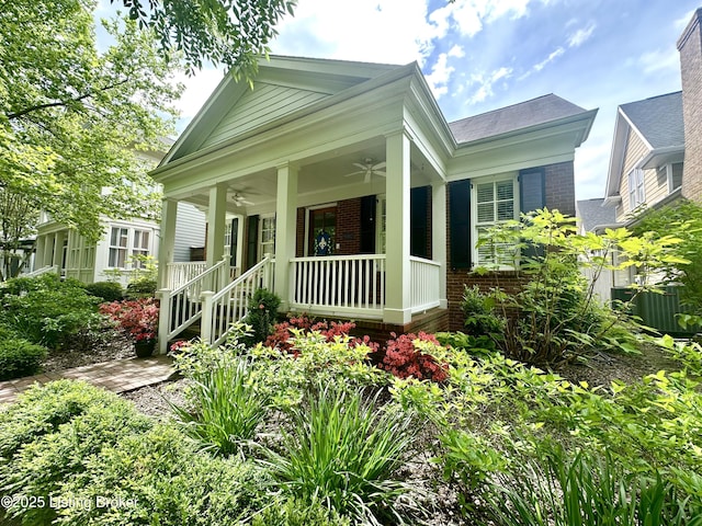 9502 Gerardia Ln, Prospect, KY 40059 - view of front of home with brick siding, a ceiling fan, covered porch, and central AC unit