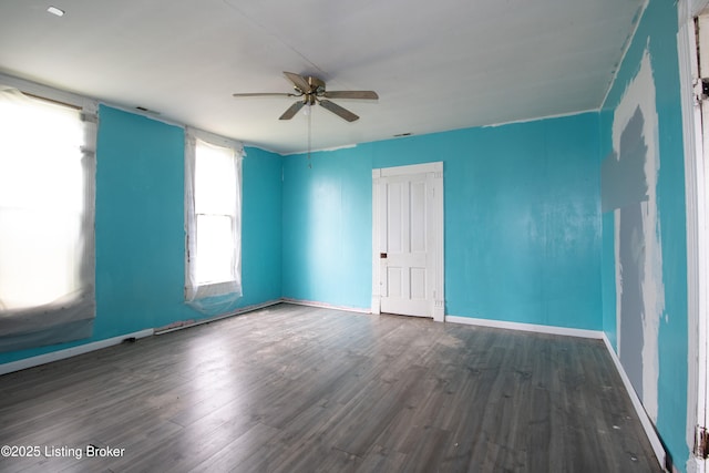 3497 Hundred Acre Pond Rd, Hardyville, KY 42746 - spare room featuring baseboards, a ceiling fan, and wood finished floors