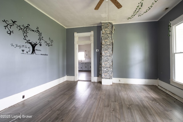 3497 Hundred Acre Pond Rd, Hardyville, KY 42746 - spare room with a healthy amount of sunlight, a ceiling fan, ornamental molding, and wood finished floors