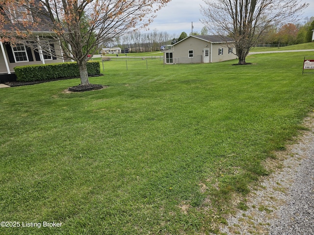 view of yard with fence