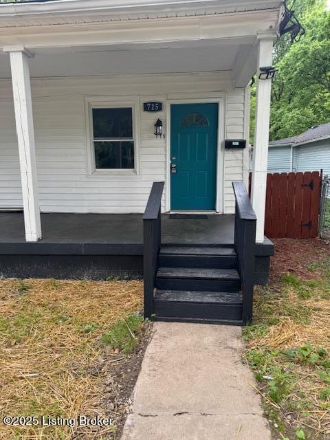 715 W Evelyn Ave, Louisville, KY 40215 - view of exterior entry featuring covered porch