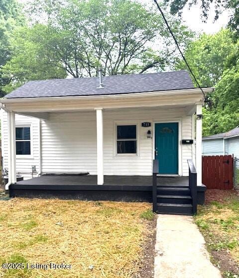 715 W Evelyn Ave, Louisville, KY 40215 - view of front of property with covered porch and a shingled roof