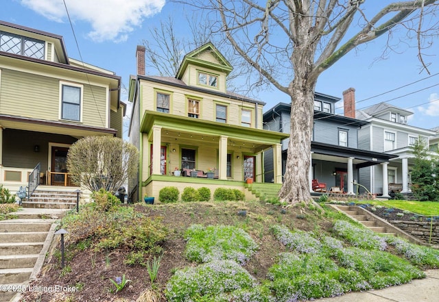 traditional style home featuring covered porch