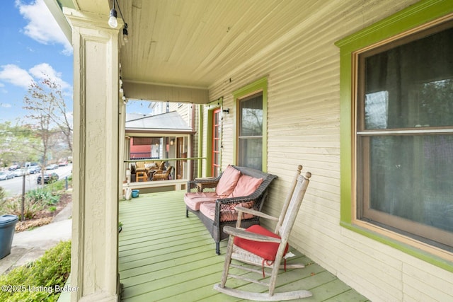 wooden deck with a porch